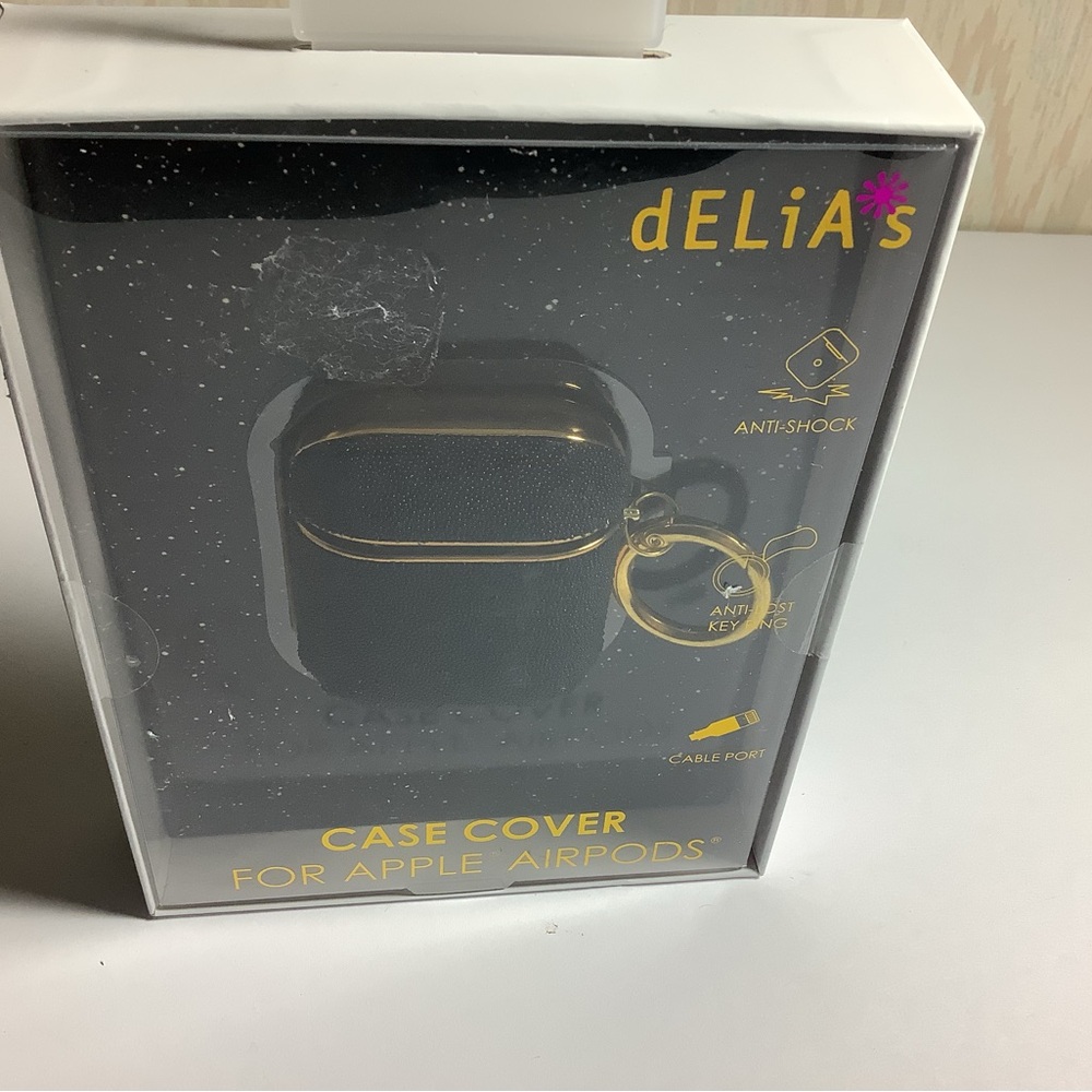 Delia’s black glitter, gold carabiner AirPod case.